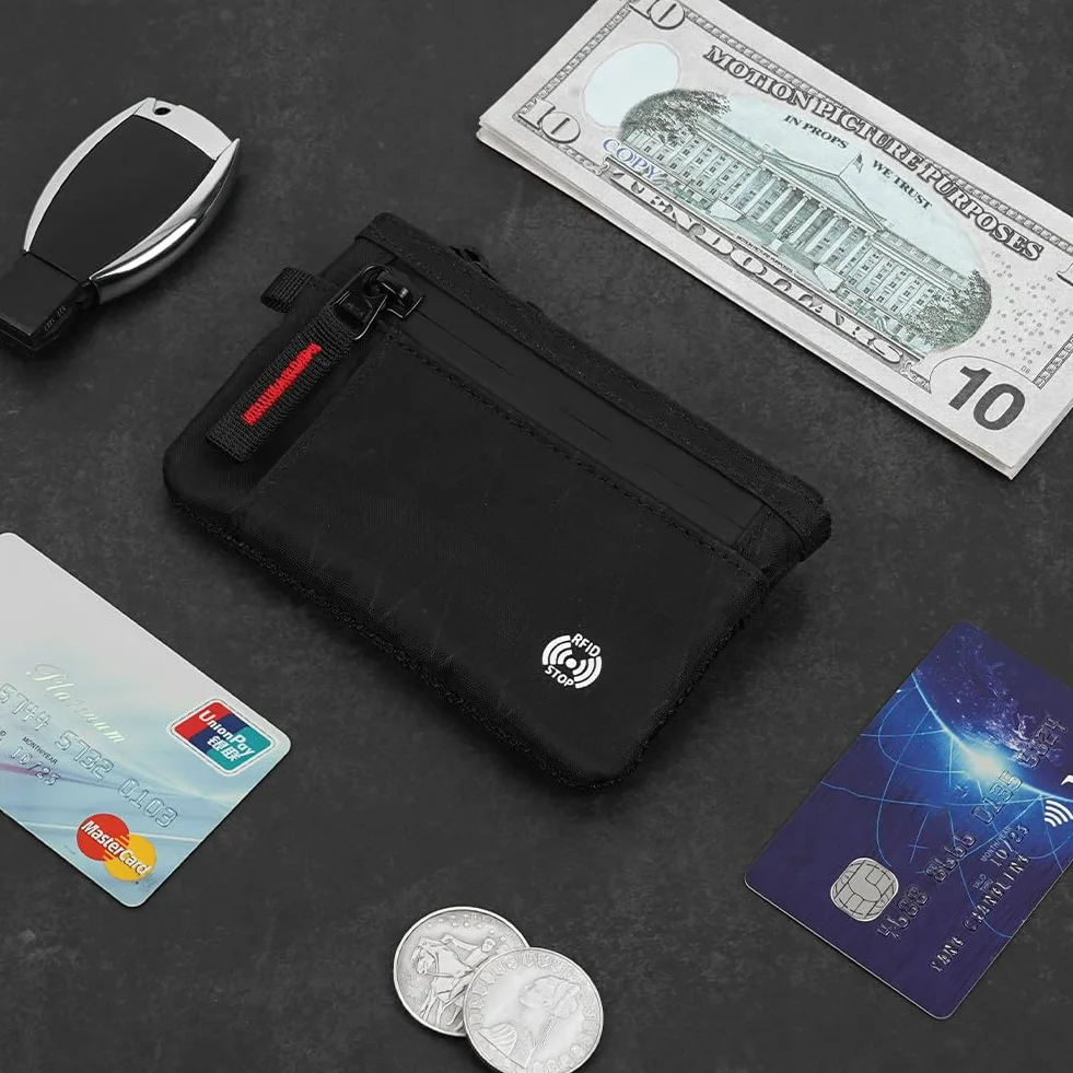 DiULi Mały portfel z blokadą RFID dla mężczyzn i kobiet | Bezpieczny podróżny portfel z zamkiem na karty z kieszenią na monety | Kompaktowy, wąski, minimalistyczny portfel RFID w kolorze czarnym
