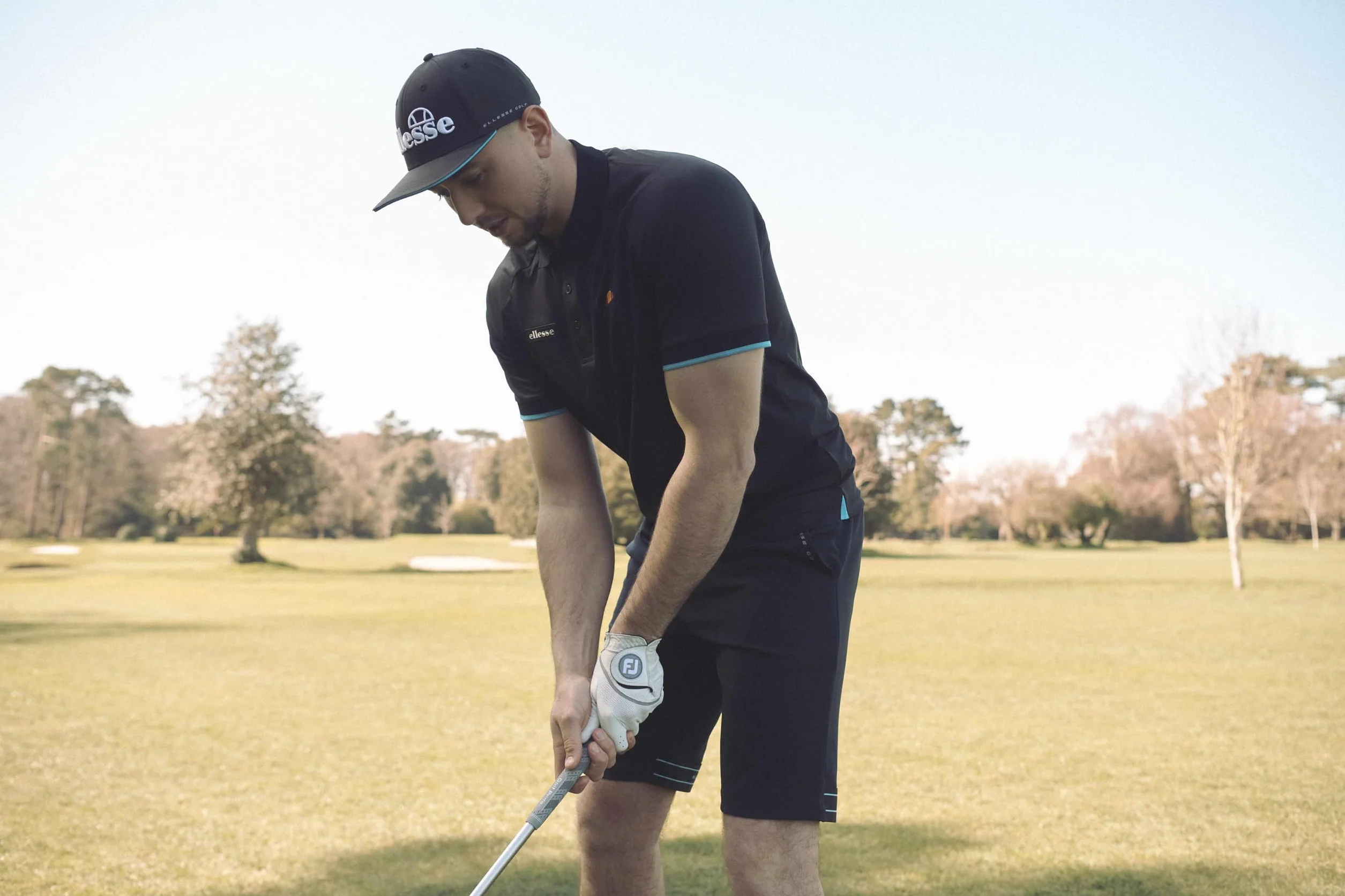 ELLESSE Fabbri męskie spodenki golfowe Regular Fit, Czarny/niebieski, 32W