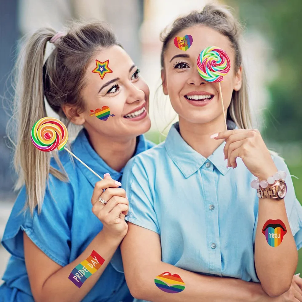 AOMIG 70+ stylów tatuaży z dumą, 10 dużych arkuszy tymczasowych tatuaży Gay Pride, wodoodporne naklejki z tatuażami LGBT Rainbow Flag na festiwale Pride dekoracje świąteczne