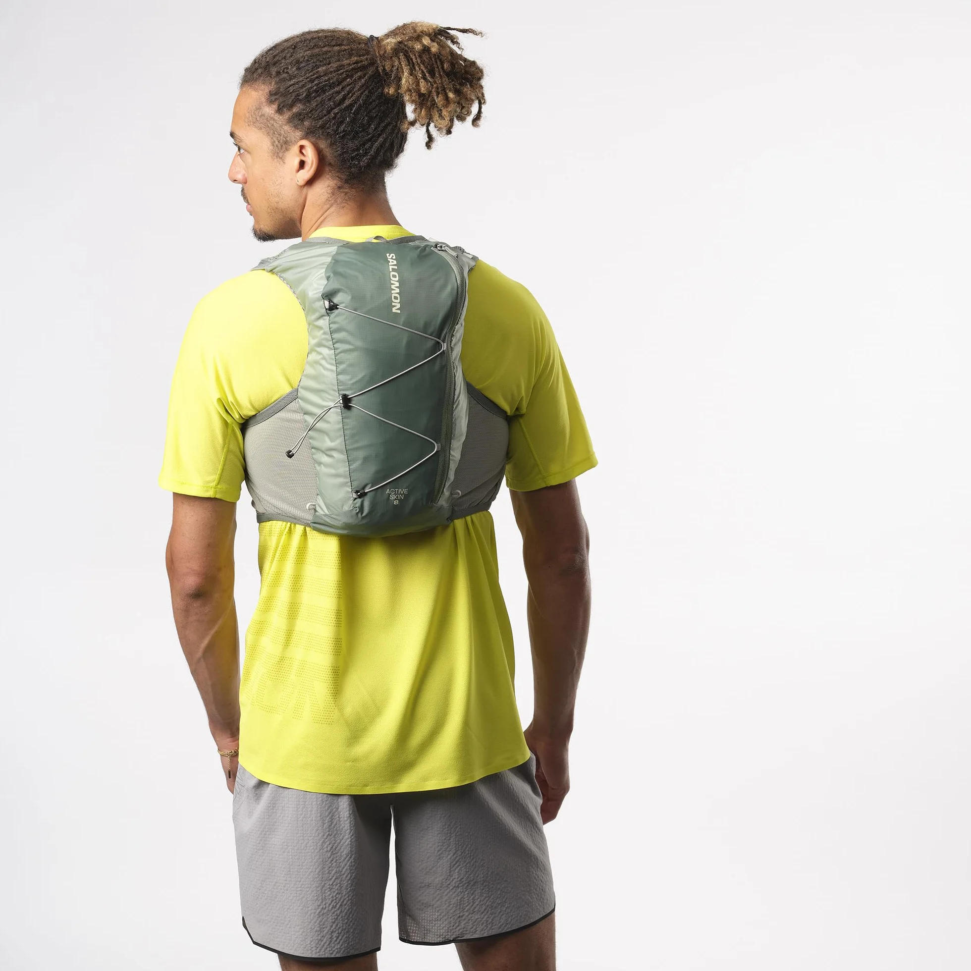 Salomon Active Skin 8 Unisex kamizelka nawadniająca do biegania szlak turystyczny z butelkami w zestawie, łatwe nawodnienie, precyzyjne dopasowanie 8 l i zoptymalizowane przechowywanie, zielona, L