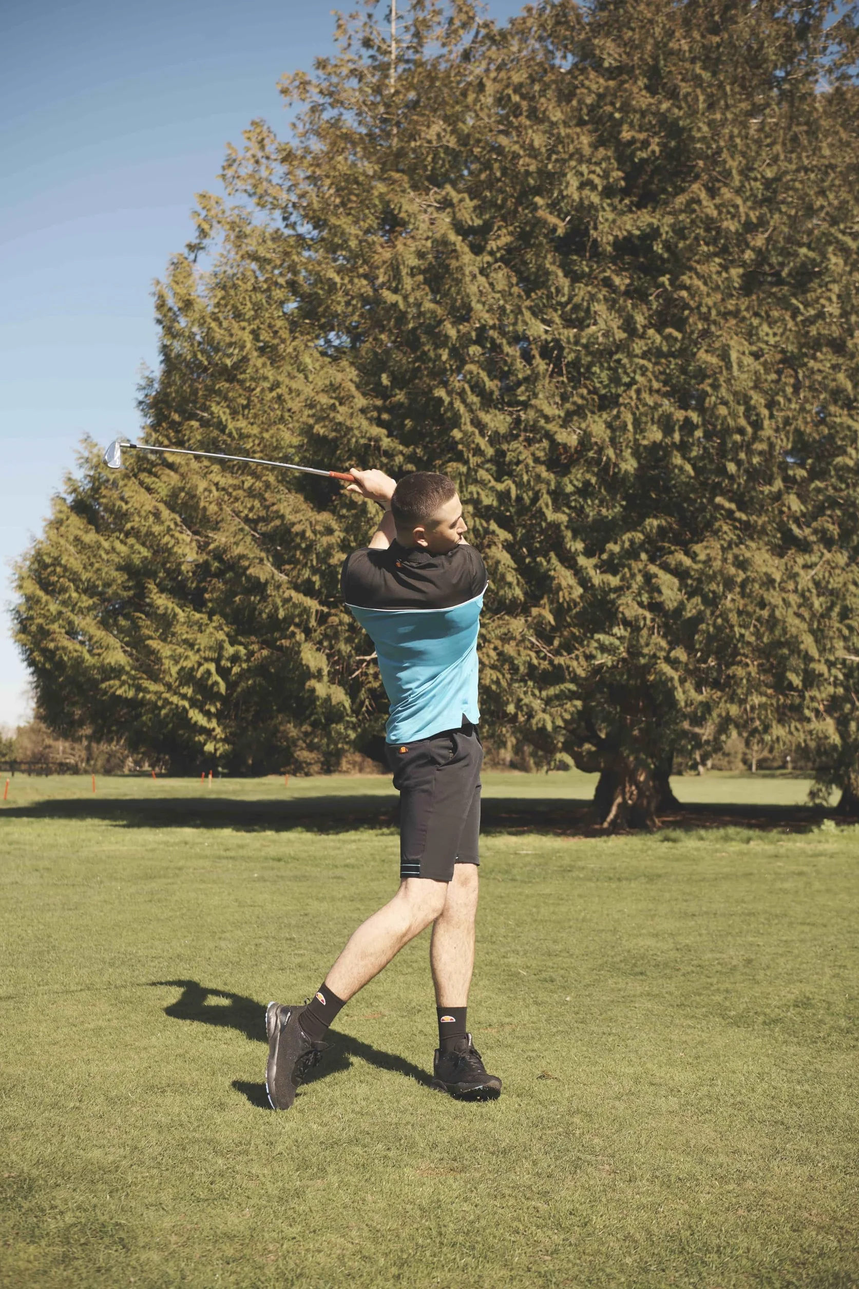 ELLESSE Fabbri męskie spodenki golfowe Regular Fit, Czarny/niebieski, 32W