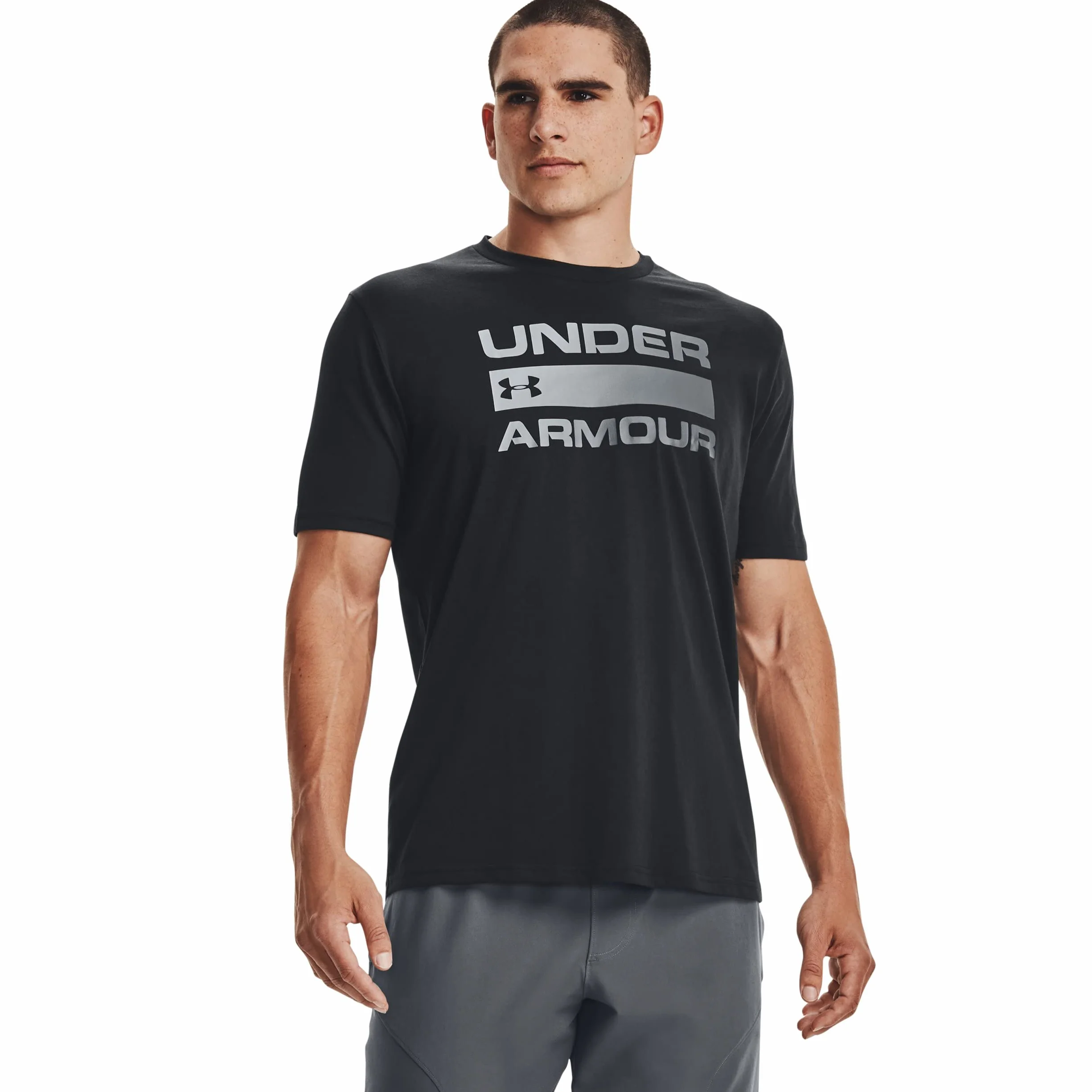 Under Armour Oddychająca koszulka sportowa, koszulka z krótkim rękawem i wygodna koszulka funkcyjna o luźnym kroju Mężczyźni Ua Team Issue Wordmark