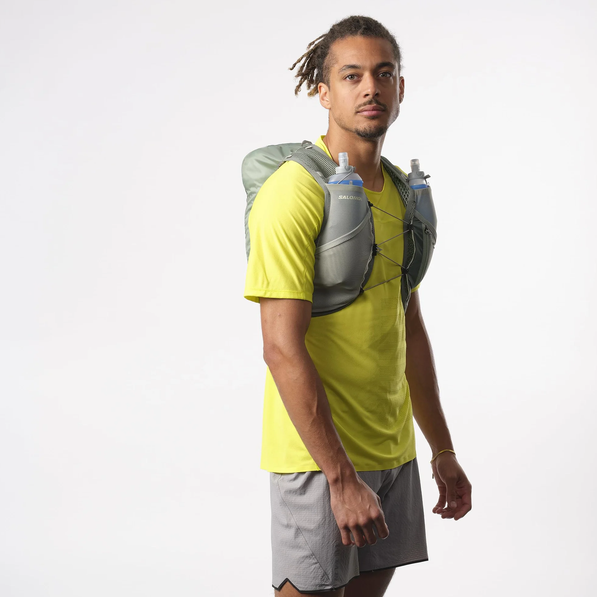 Salomon Active Skin 8 Unisex kamizelka nawadniająca do biegania szlak turystyczny z butelkami w zestawie, łatwe nawodnienie, precyzyjne dopasowanie 8 l i zoptymalizowane przechowywanie, zielona, L
