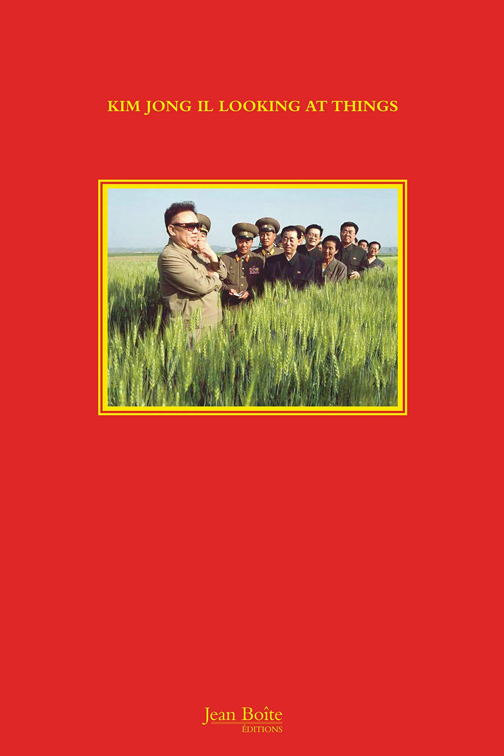Kim Jong Il looking at things